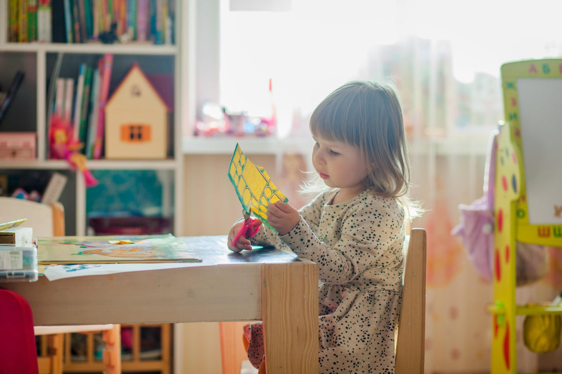 Young girl doing crafts